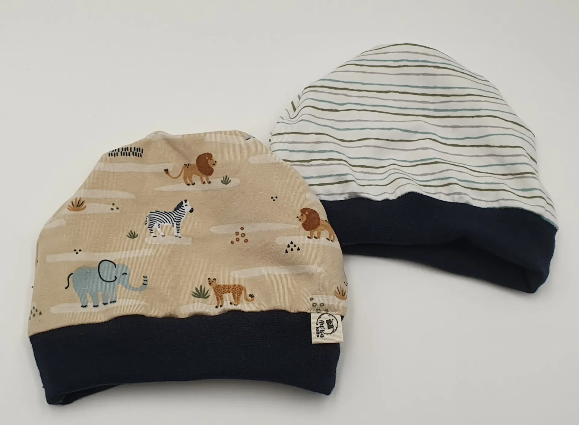 Bonnet réversible avec bord-côte SAFARI (Taille 0 (0-2M))