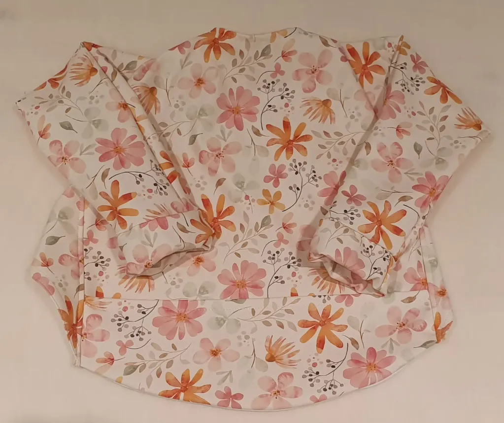 Bavoir à manches FLEURS ORANGES